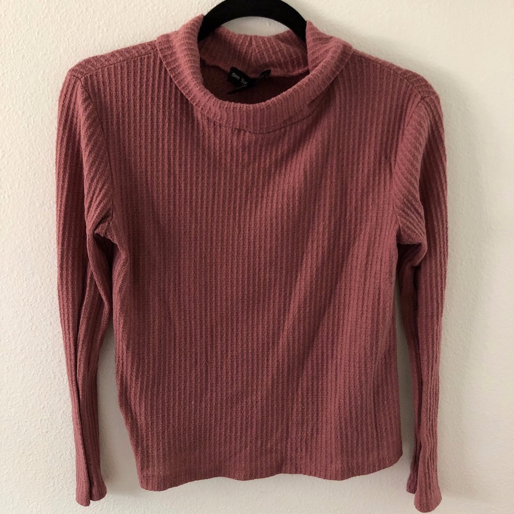 pink turtleneck